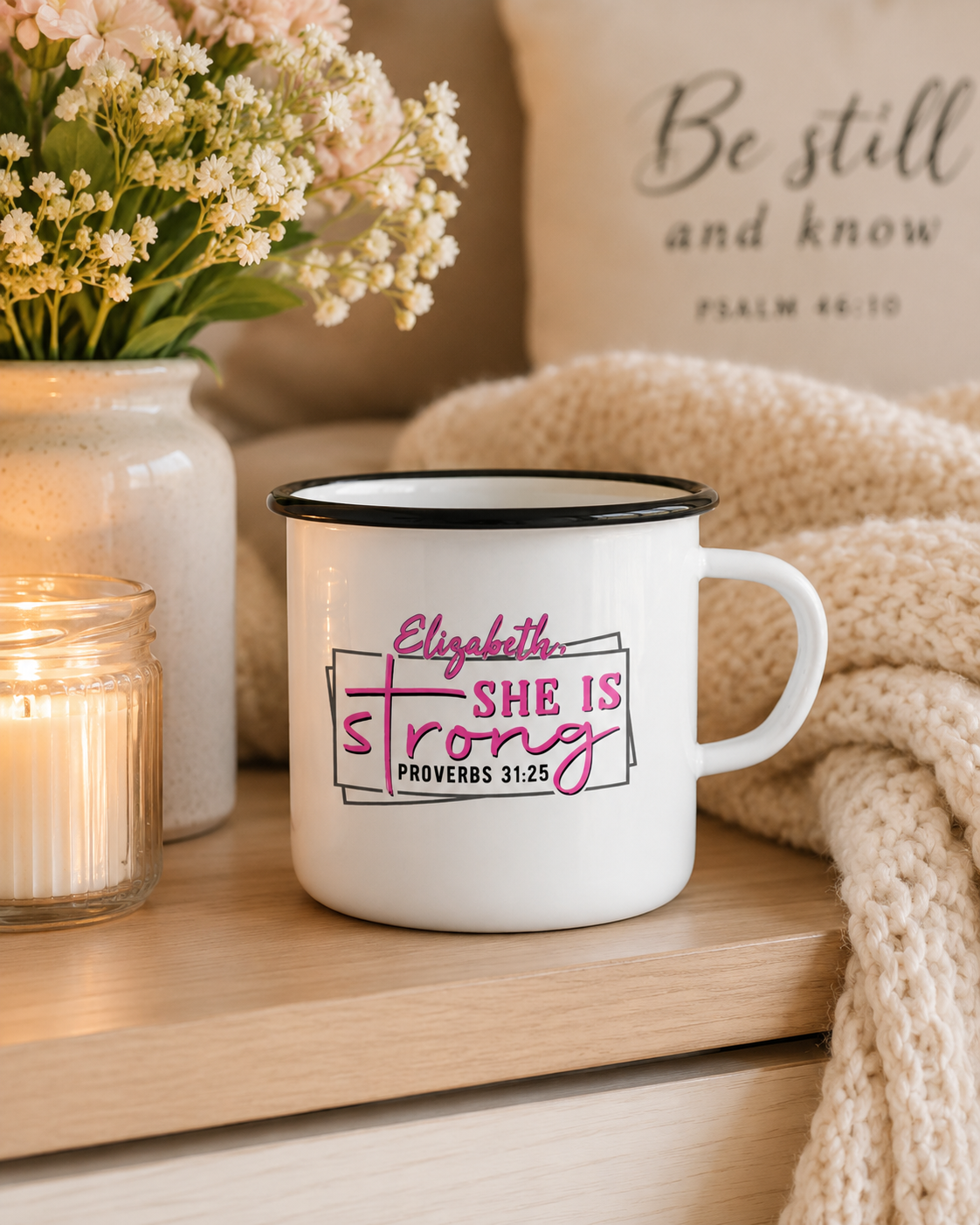Personalized Proverbs 31 camp mug styled with flowers, a candle, and a cozy knitted blanket