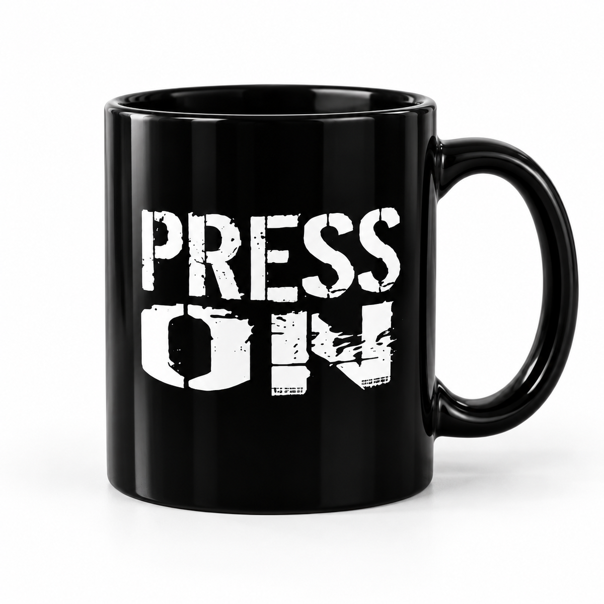 A glossy black ceramic mug with the words 'PRESS ON' printed in a distressed white typewriter-style font on the front, set against a plain white background.